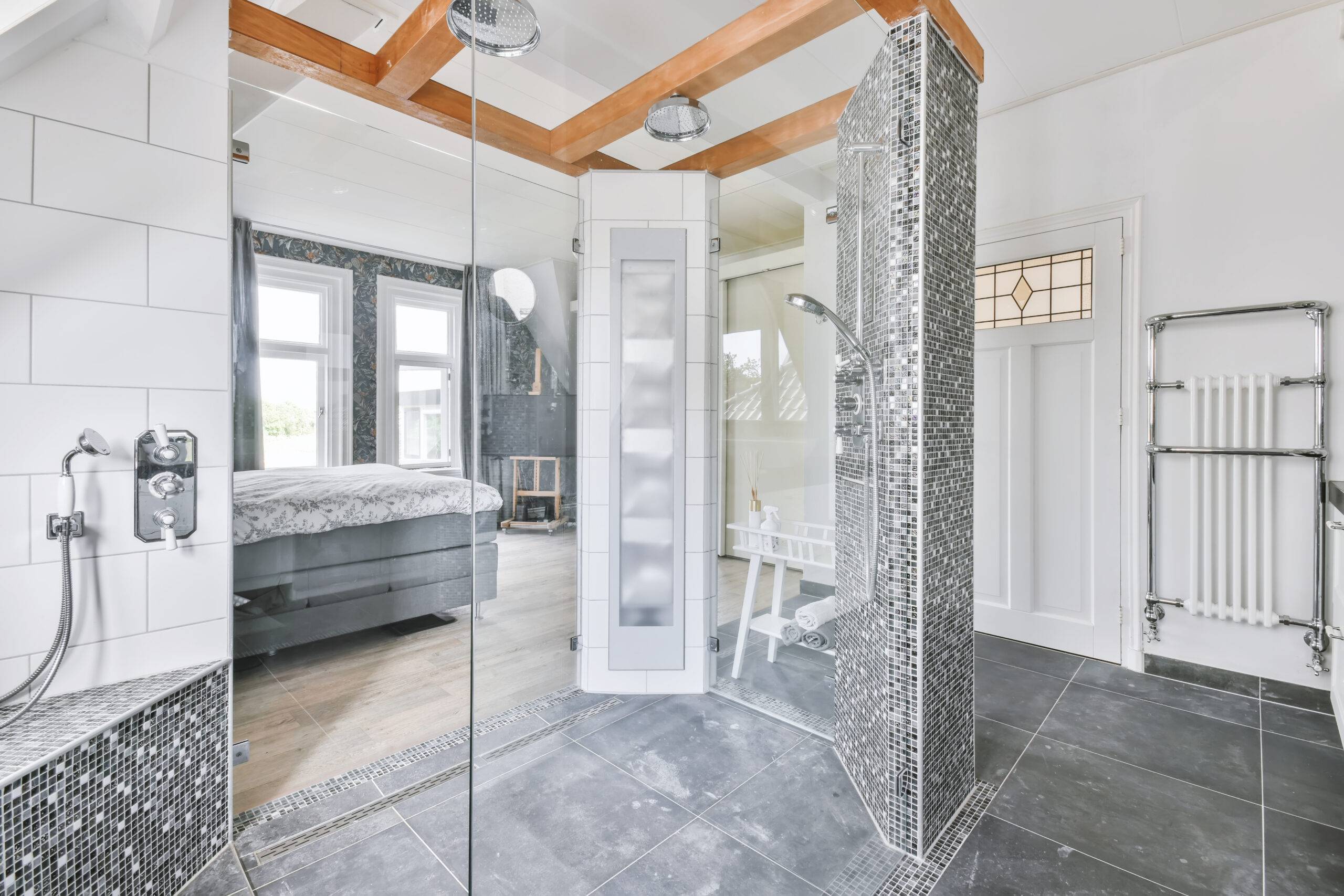 Shower room with glass doors leading to the bedroom