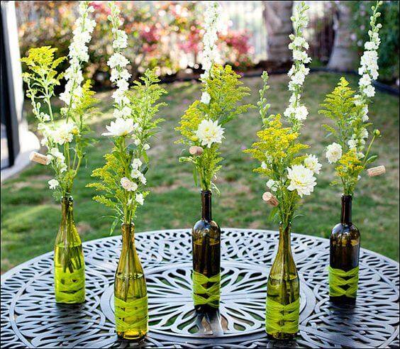 wine bottles turned into vases