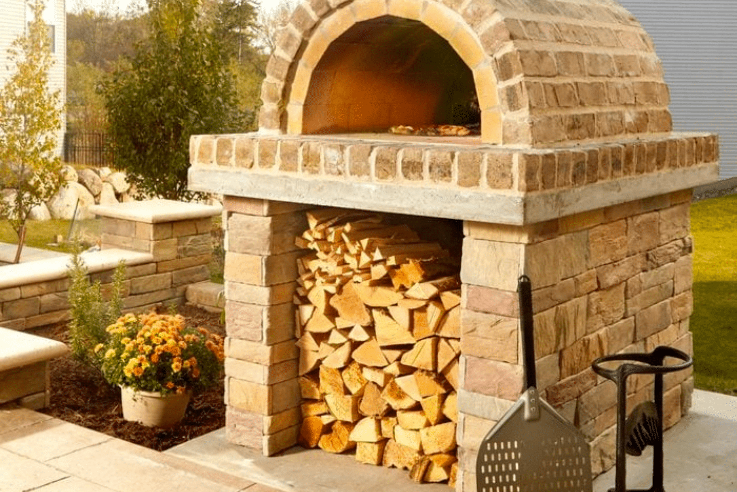Brick oven with log storage underneath.