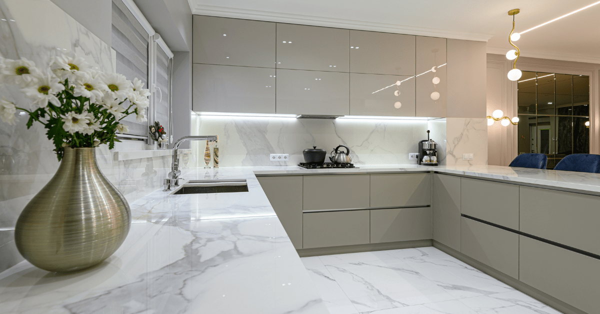 Luxurious and modern kitchen with marble flooring.