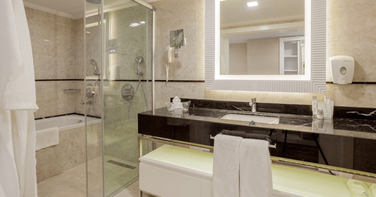 A sleek wet room bathroom with layout for small space.